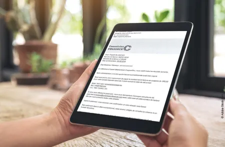 image d'une tablette avec mail d'arnaque